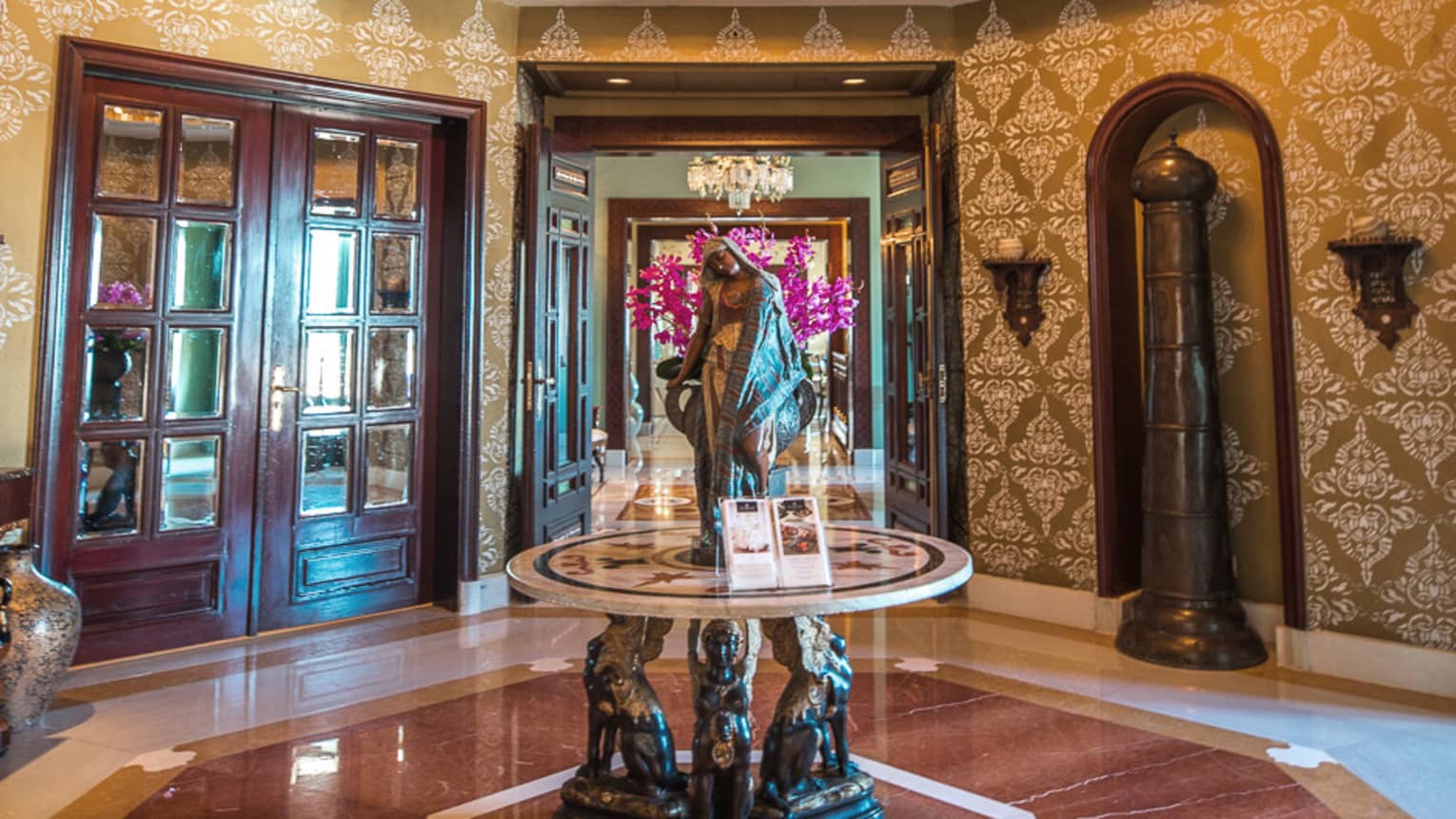 an empty ornate-styled lobby in four seasons alexandria
