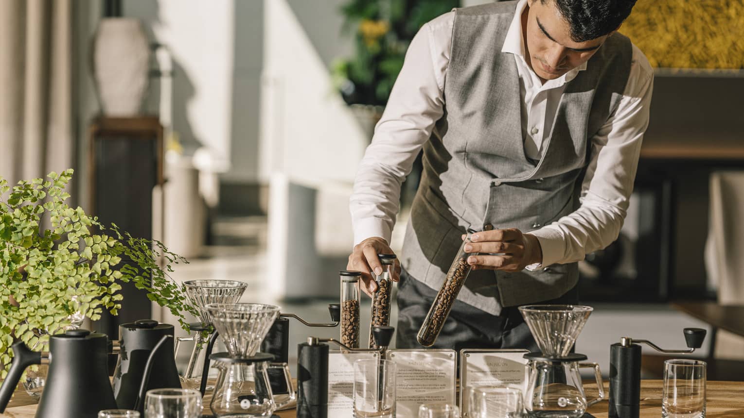 Craftsperson prepares Thai drip coffee