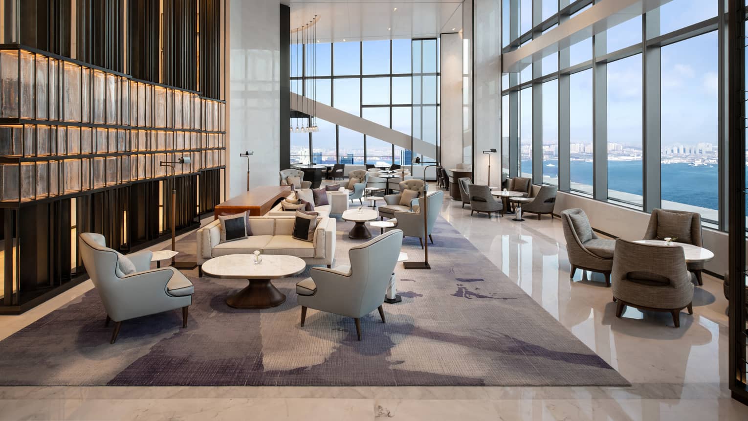 Hotel lounge with water view at Four Seasons Hotel Dalian