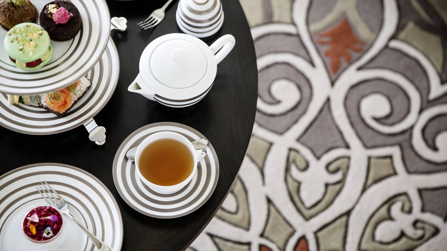 Modern Afternoon Tea platter with grey striped tea cups, platters and dessert tray