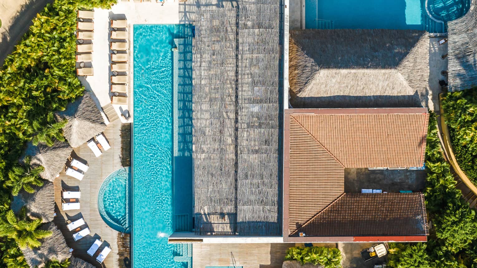 Aerial view of  Four Seasons Resort Punta Mita outdoor swimming pools, patios