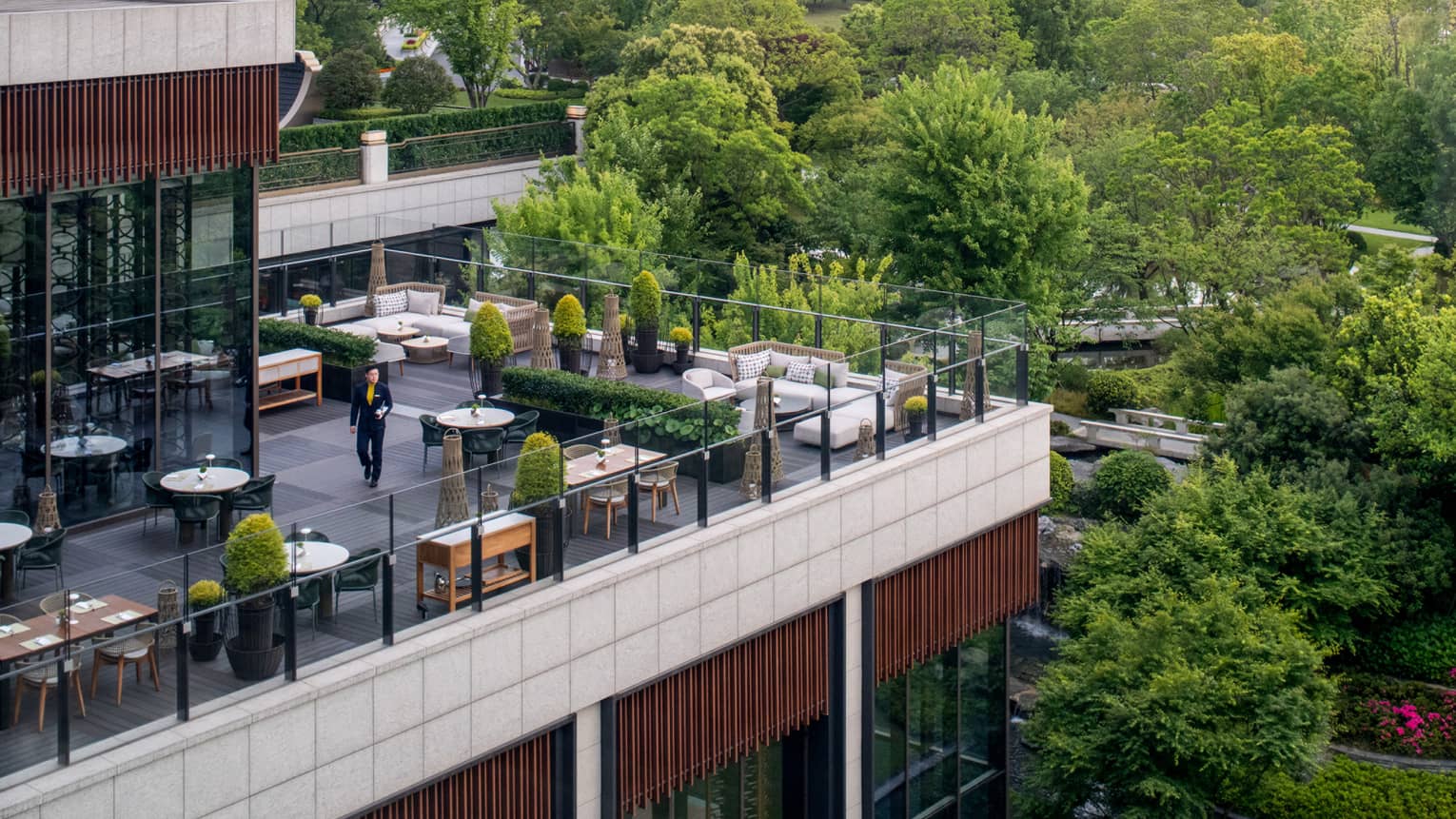 Exterior shot of elevated outdoor terrace restaurant at Four Seasons Hotel Suzhou