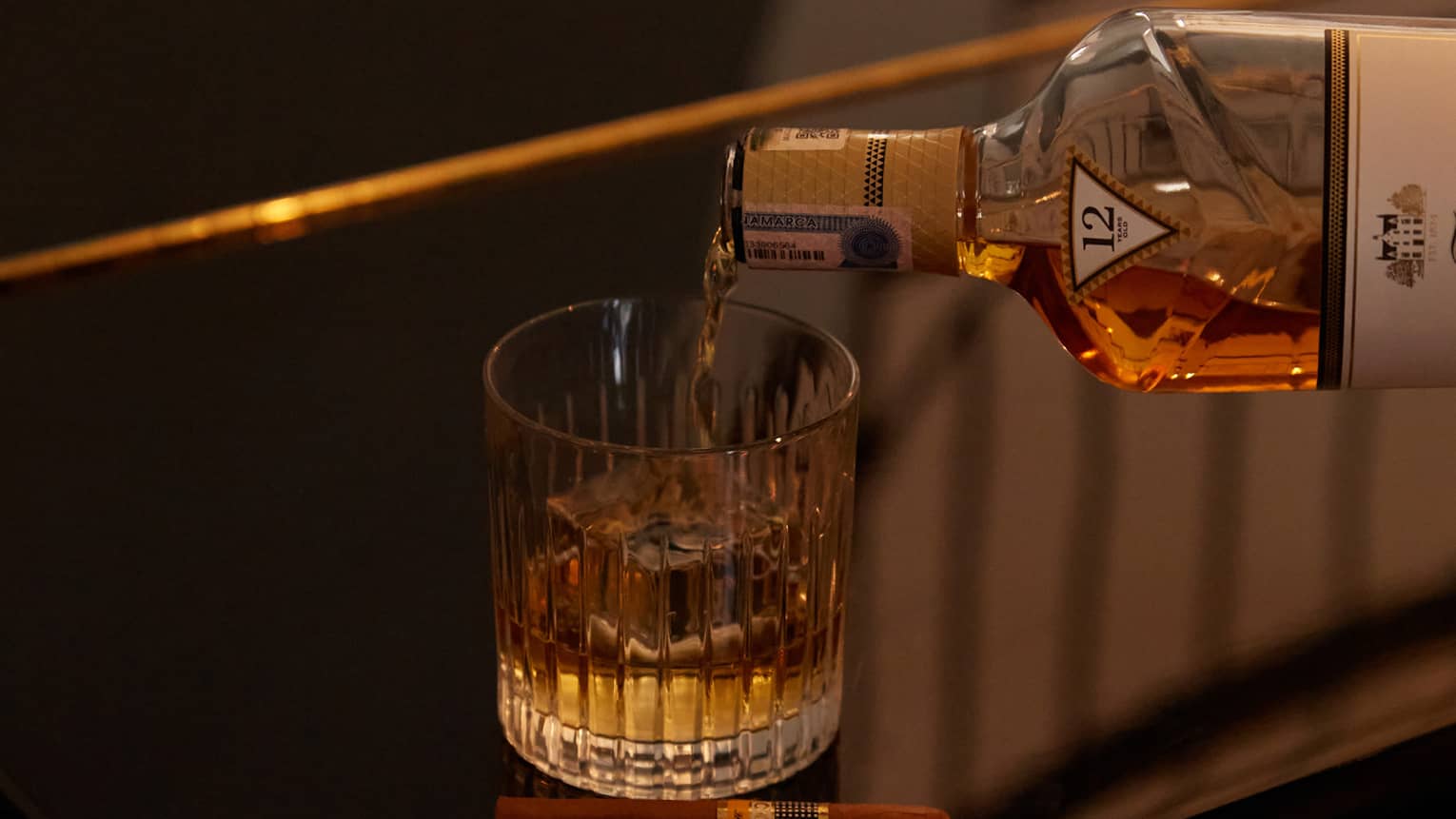 Liquor being poured into a glass.