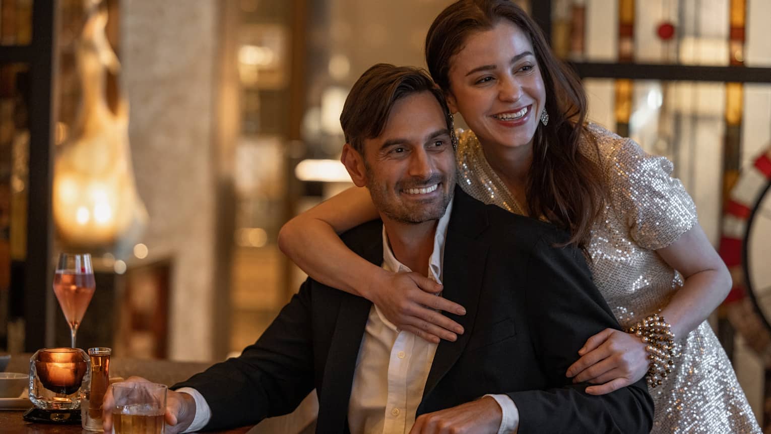 Smiling couple enjoying a Christmas celebration in Tokyo