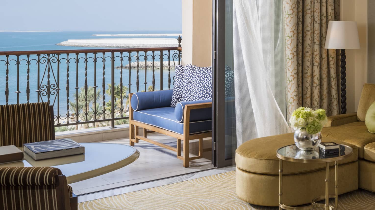 luxury hotel room with elegant decor and sea view