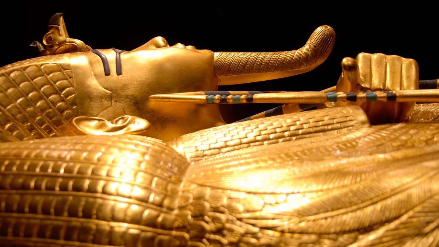 Side view of gold Pharaoh King Tutankhamun tomb in Cairo Egyptian Museum