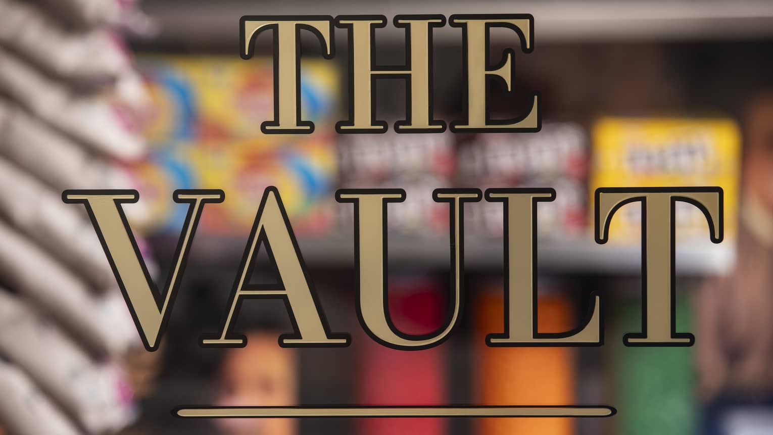 A window with a sign that says "The Vault".