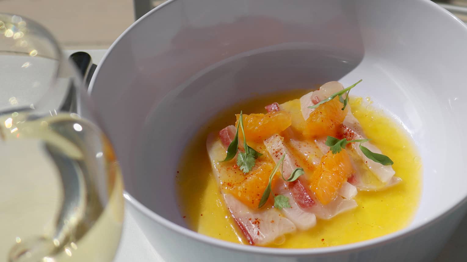 Sashimi in a white bowl.