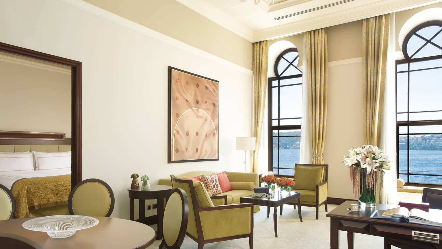 Bosphorus Palace Suite seating area, small round dining table in front of bay windows