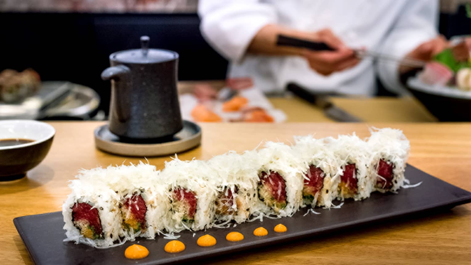 Mei Ume restaurant's spicy tuna Uramaki on a black rectangular plate