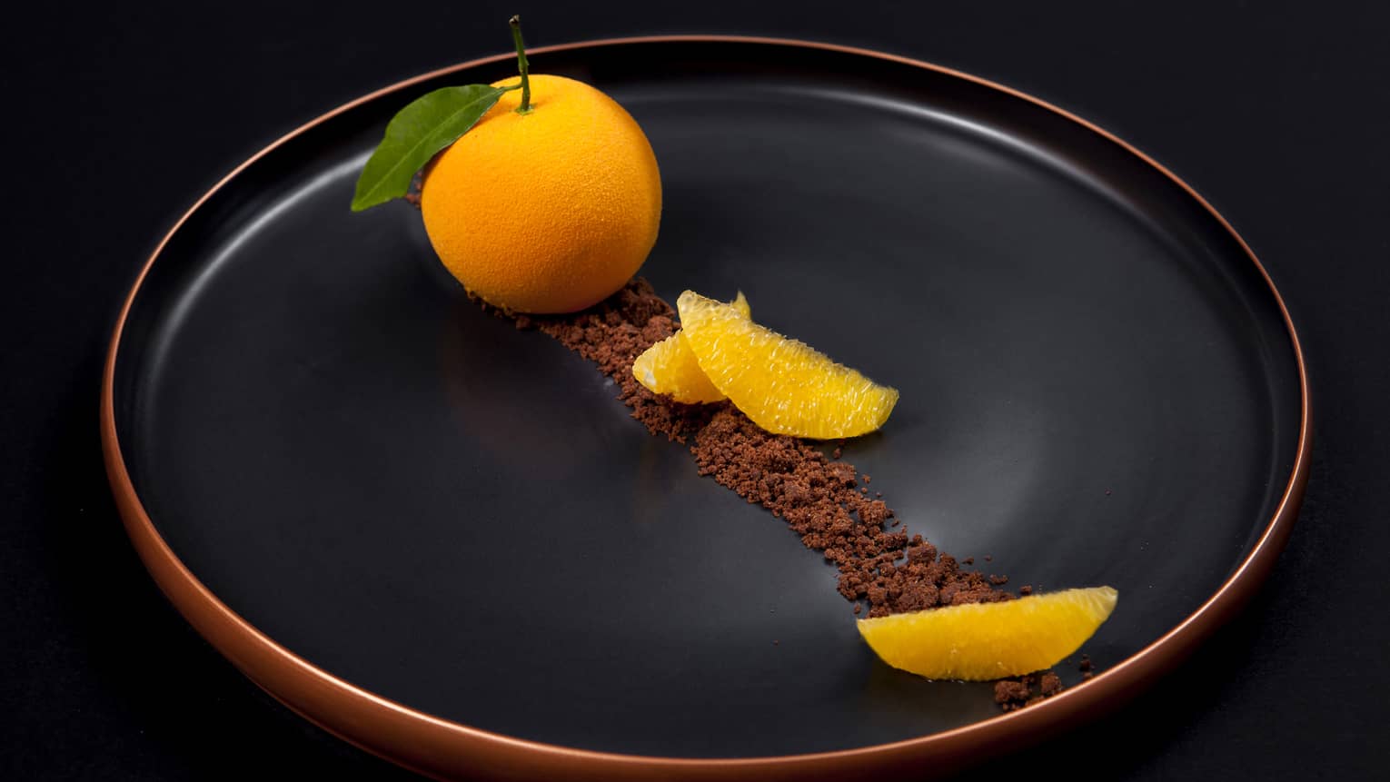 The Orange Signature Dessert served with cinnamon 