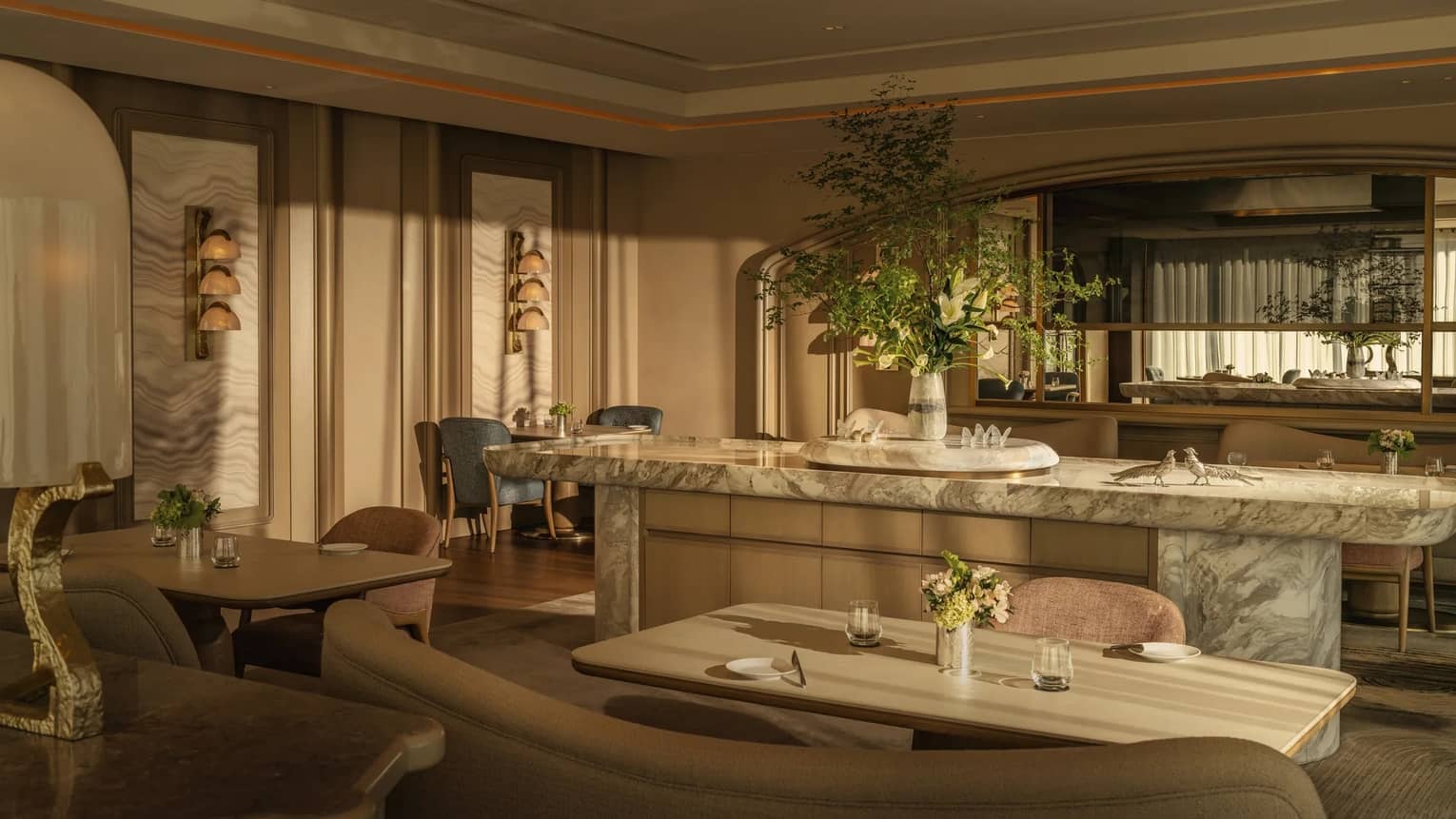 An elegant restaurant interior with marble bar counter