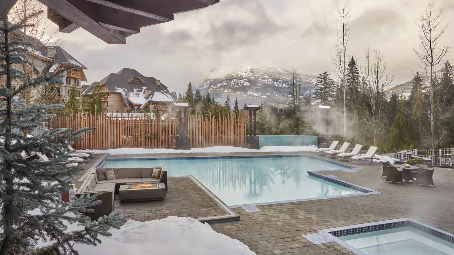 A heated outdoor pool during the winter season.
