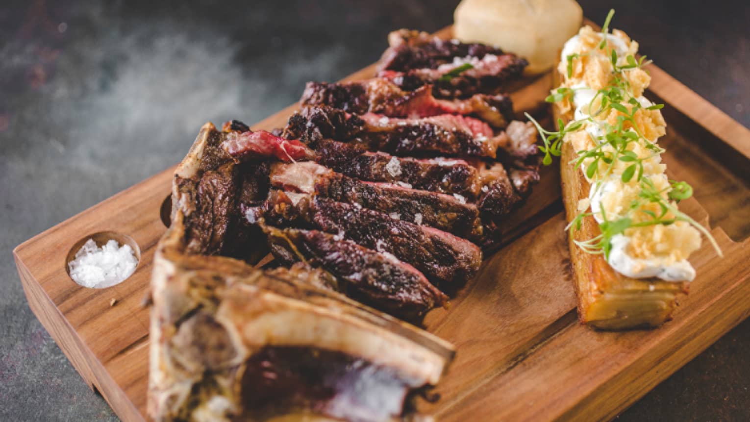 Sliced sirloin on a cutting board.
