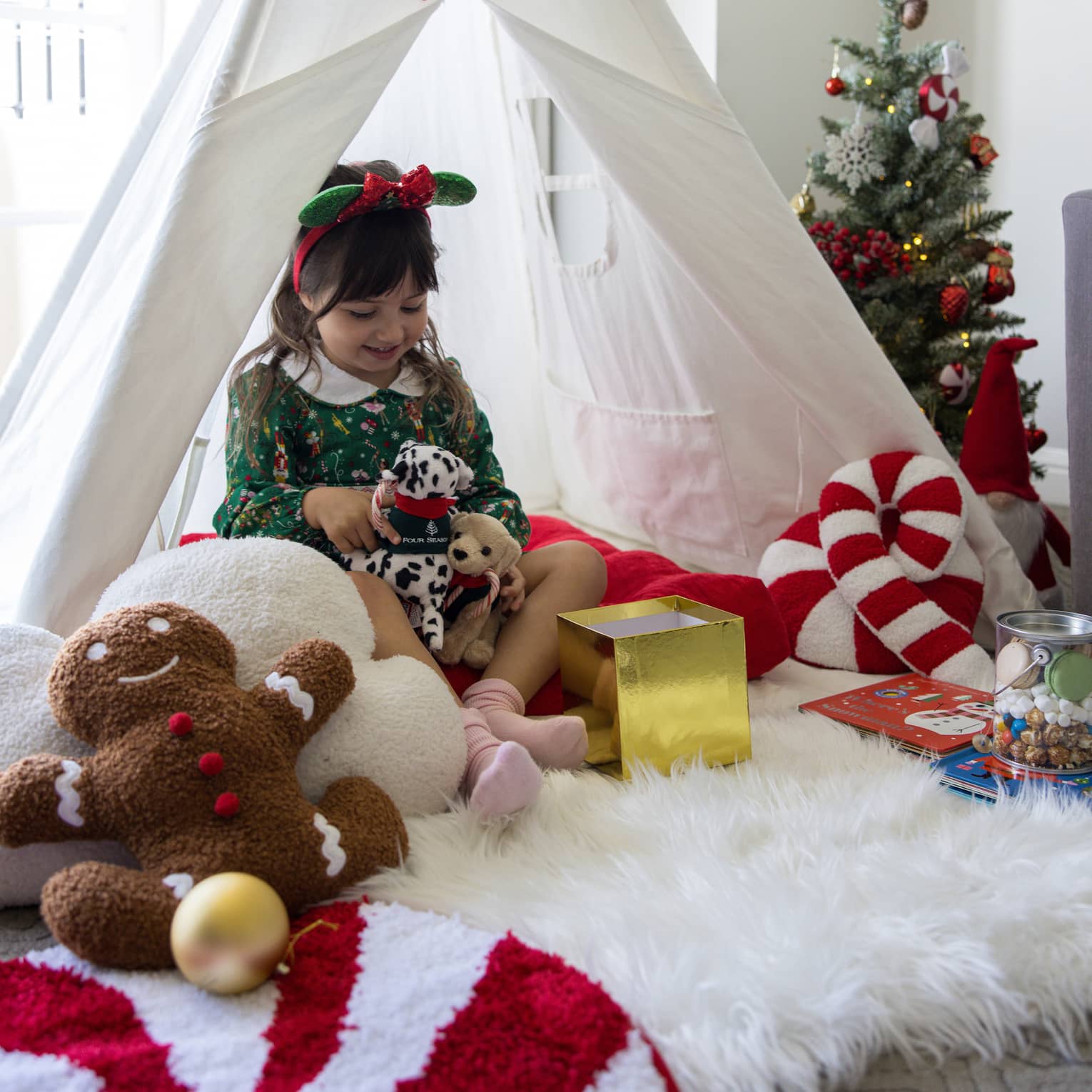 In-room glamping with festive decor