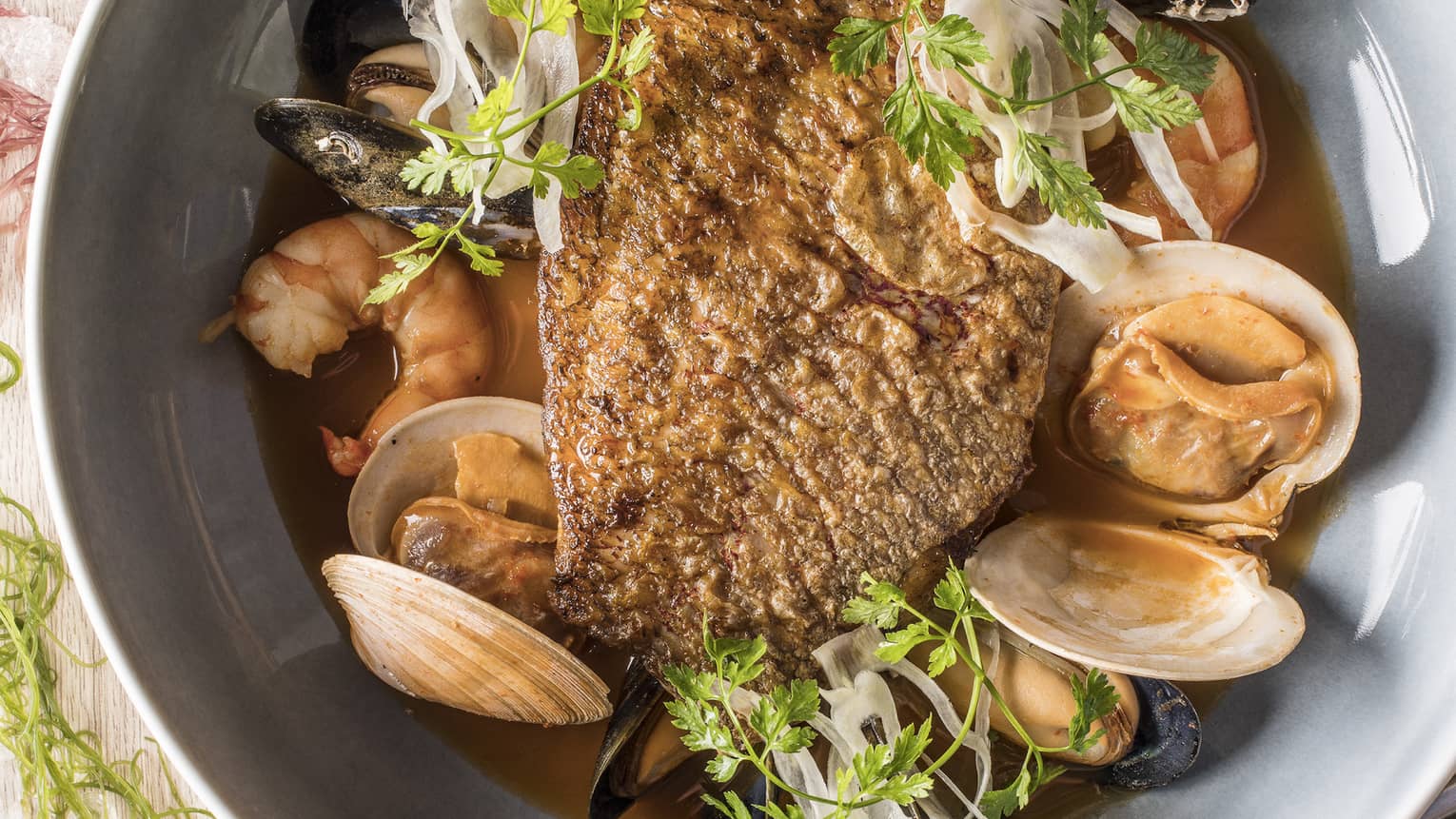 Snapper bouillabaisse with spicy diakon and lemongrass