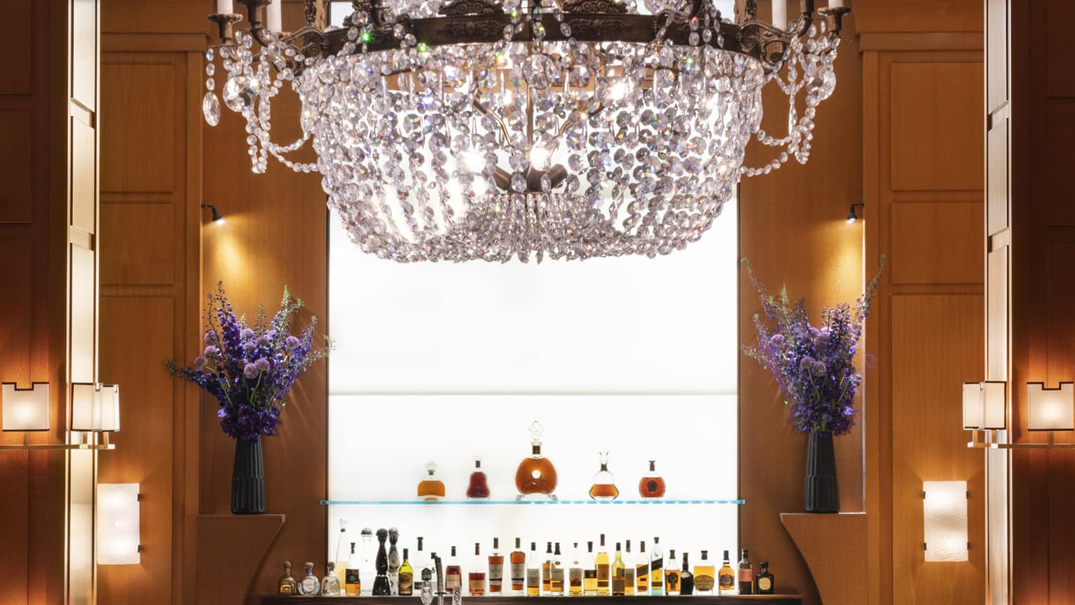 Indoor hotel bar with large crystal chandelier