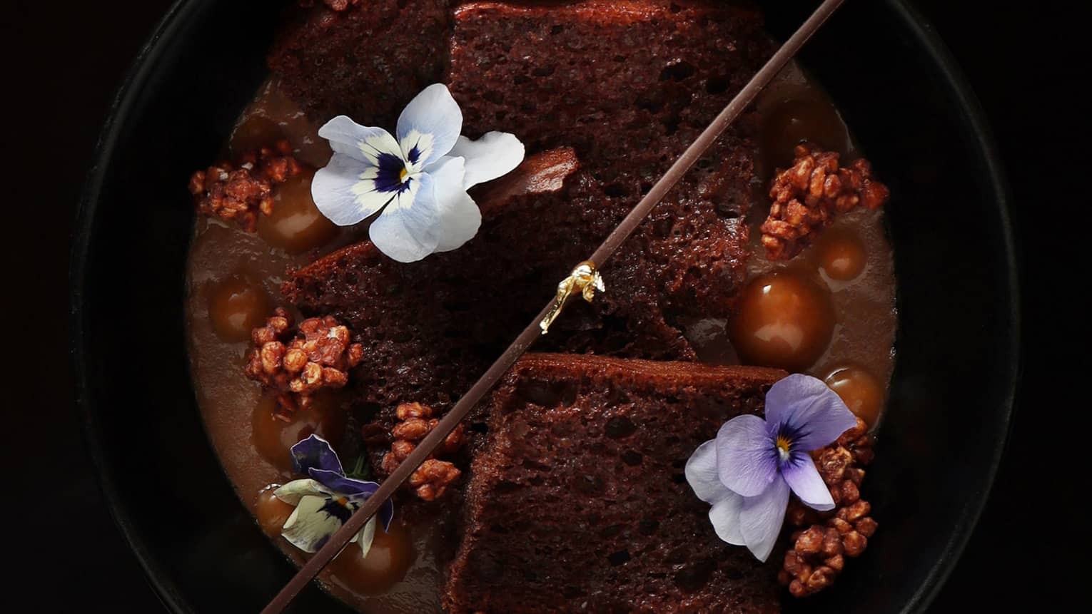 An assortment of chocolate in a bowl.