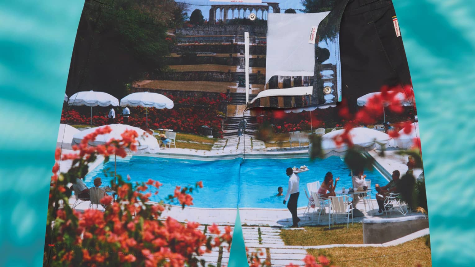 Swimsuit shorts with an image of a pool printed on it