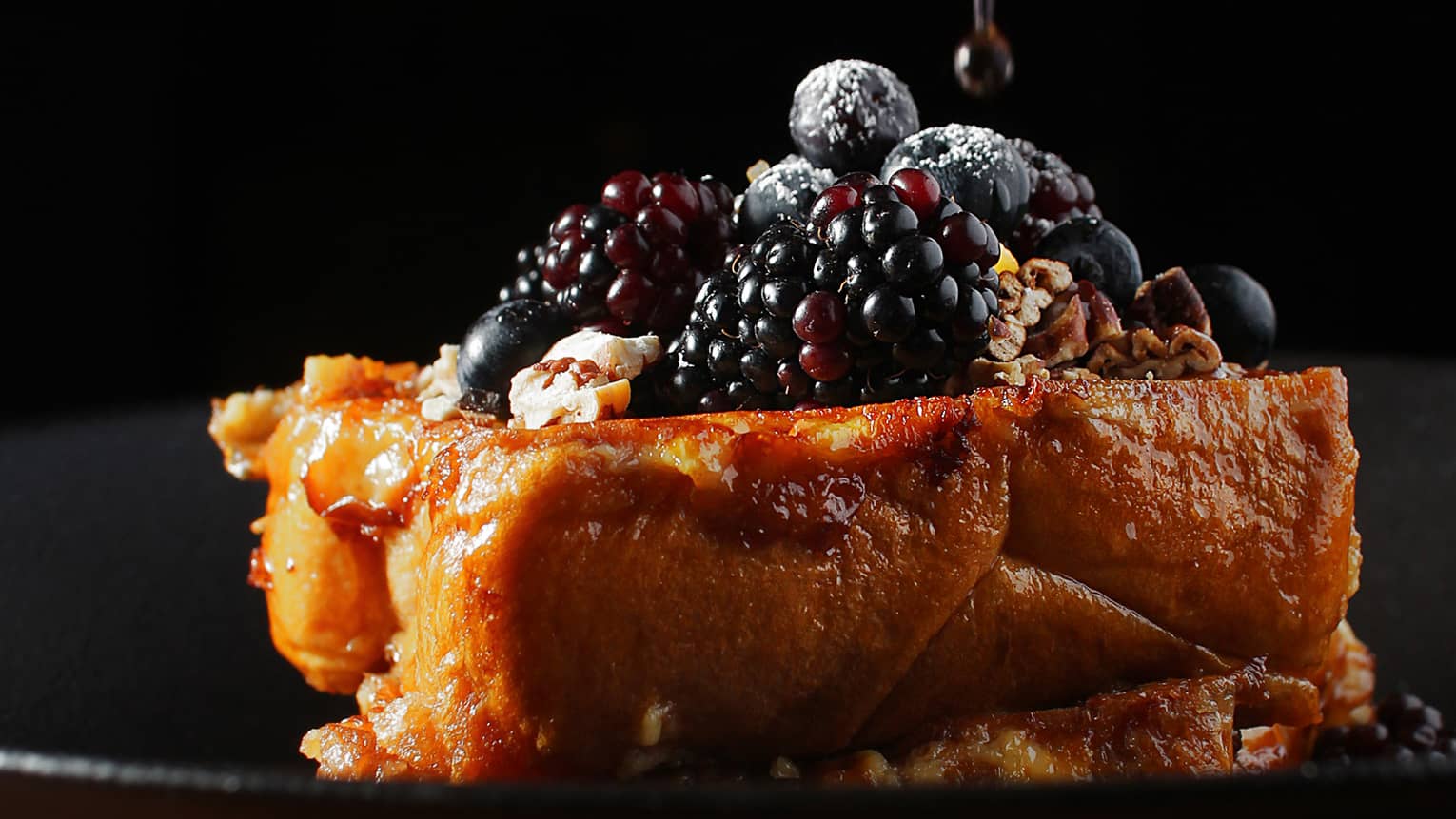 French toast with blackberries and blueberries.