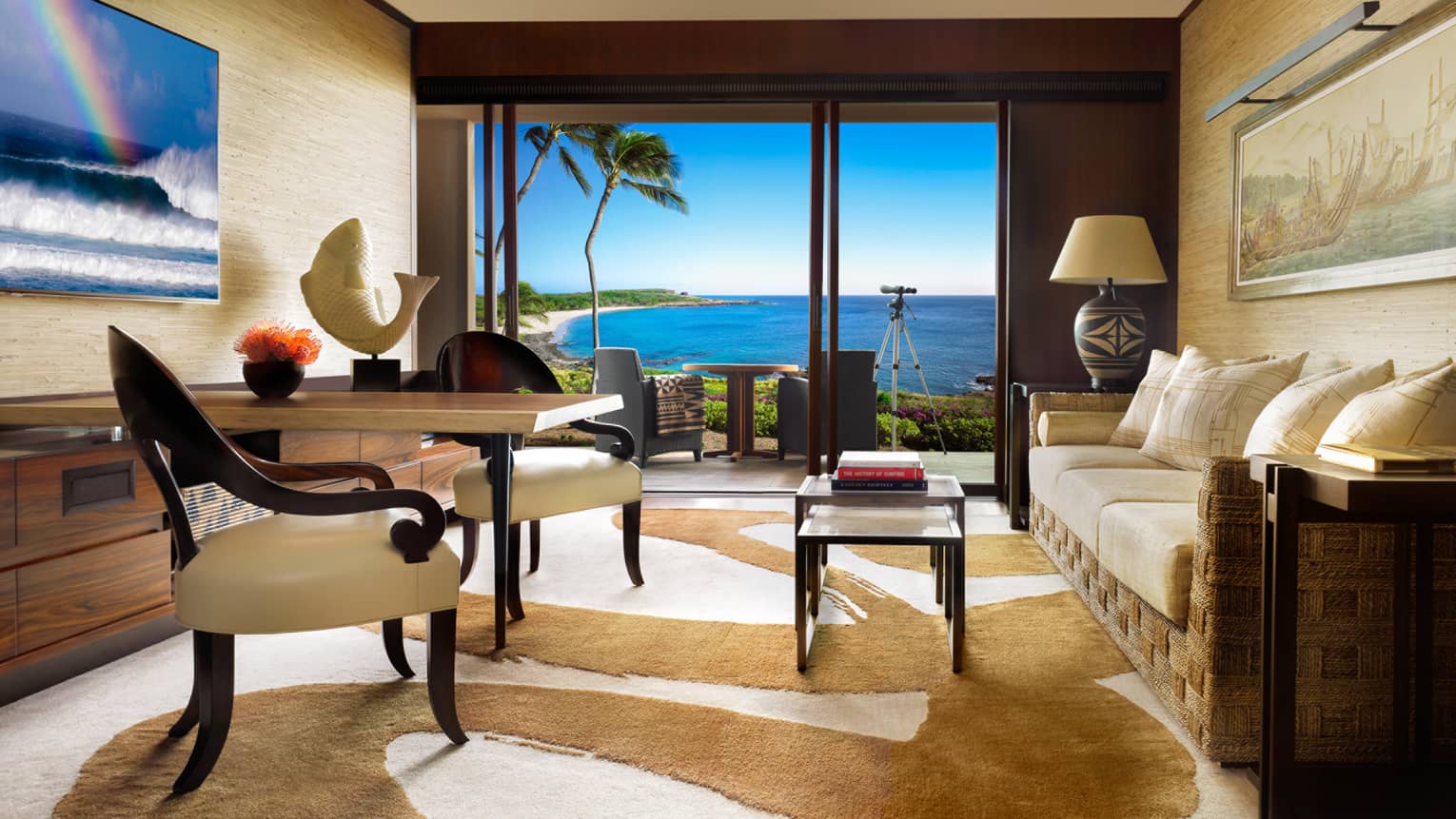 Four Seasons Prime Oceanfront Studio Suite dining chairs, table with white fish sculpture across from sofa