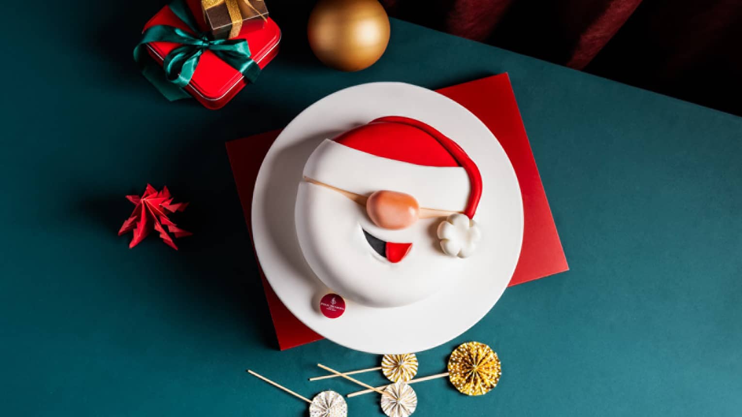 Santa Clause cherry and vanilla frosting cake