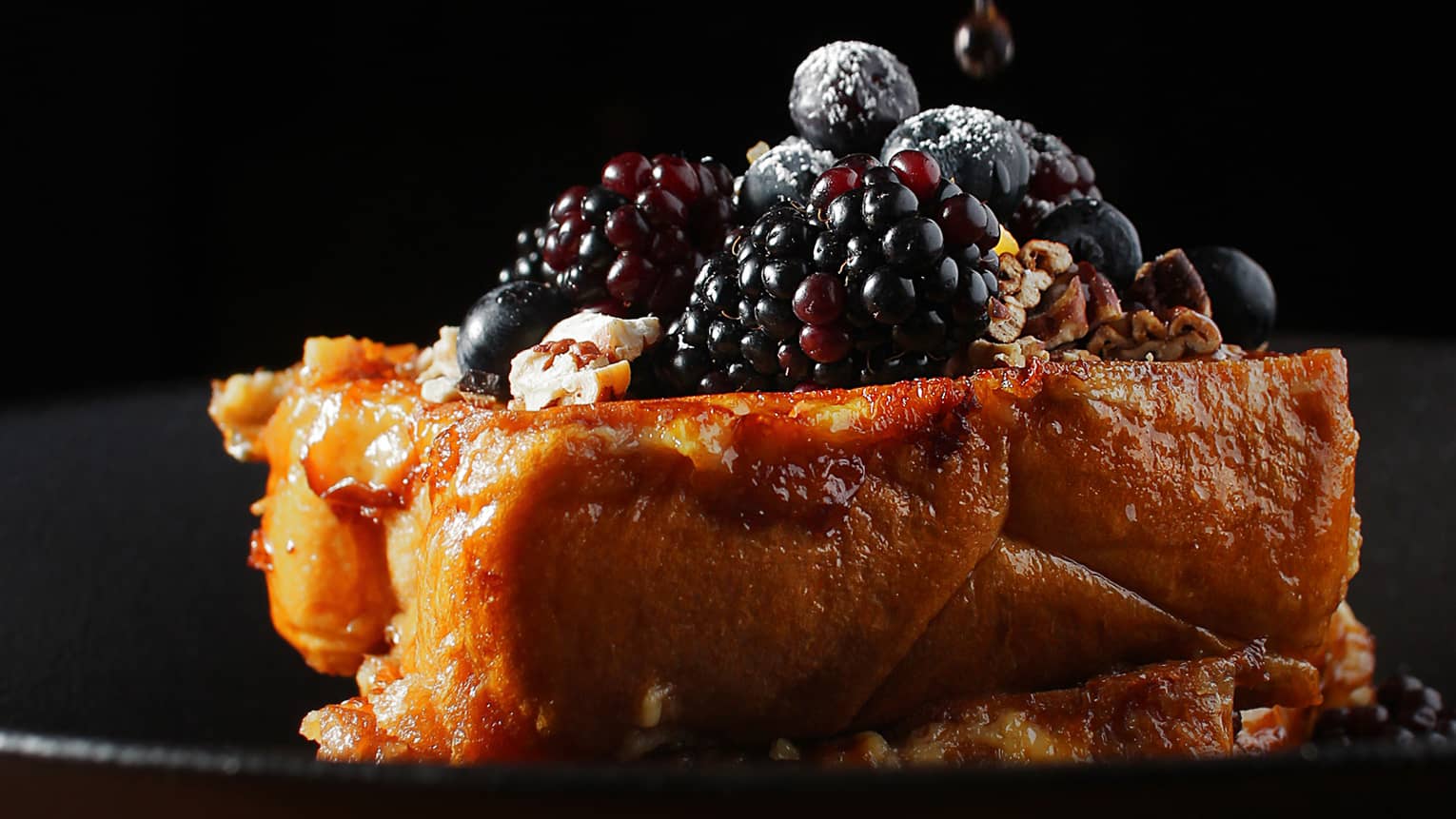 French toast with blackberries and blueberries.
