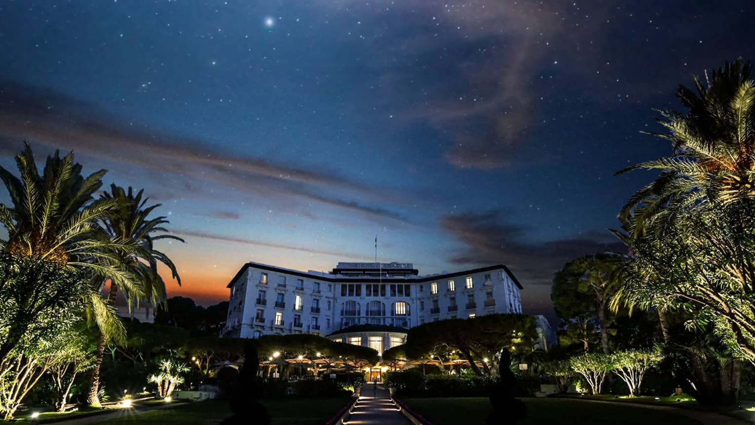 Starry sky, palm trees above Four Seasons Grand-Hotel du Cap-Ferrat