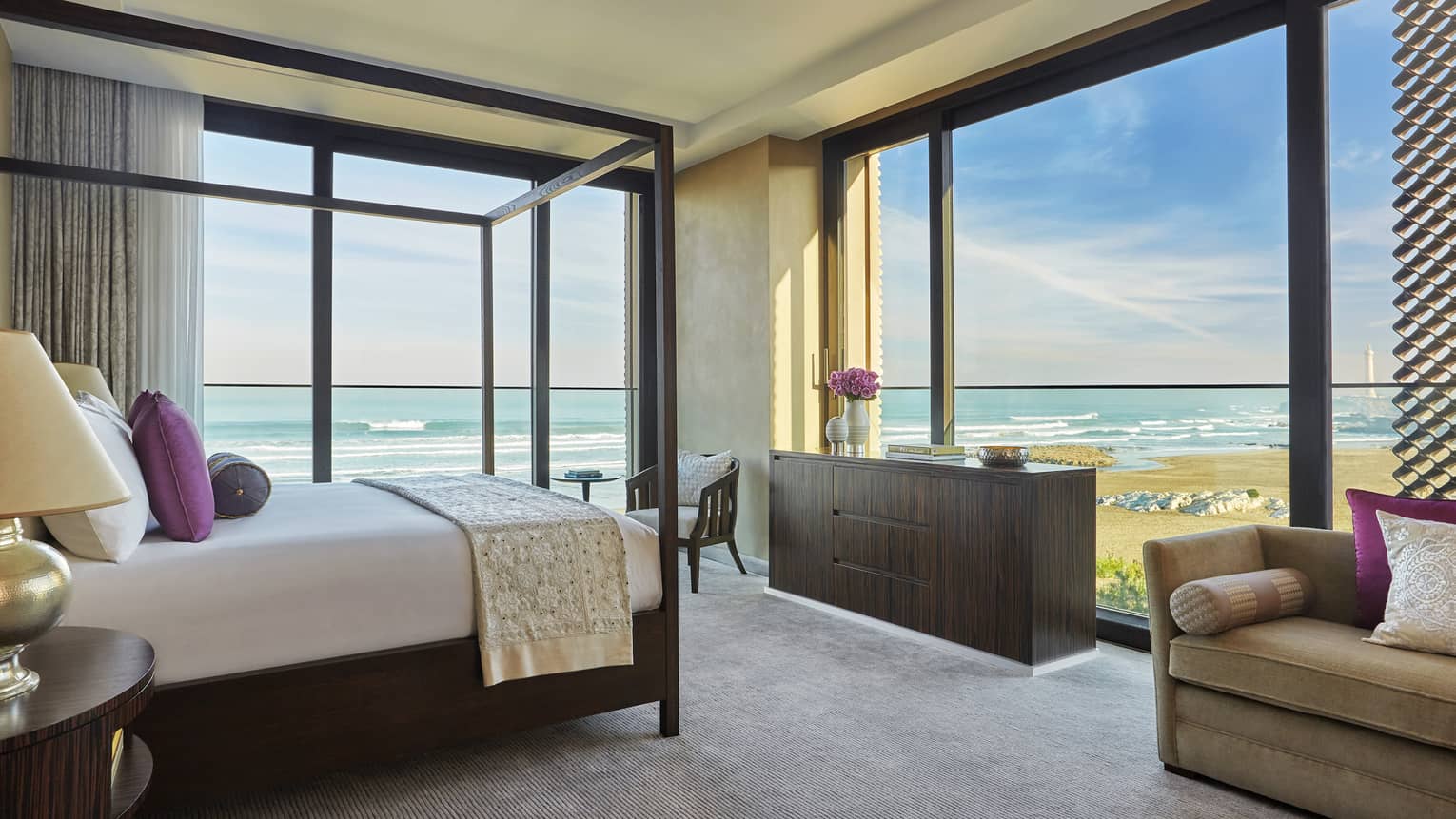 The modern Imperial Suite Ocean View Room bathed in bright sunlight