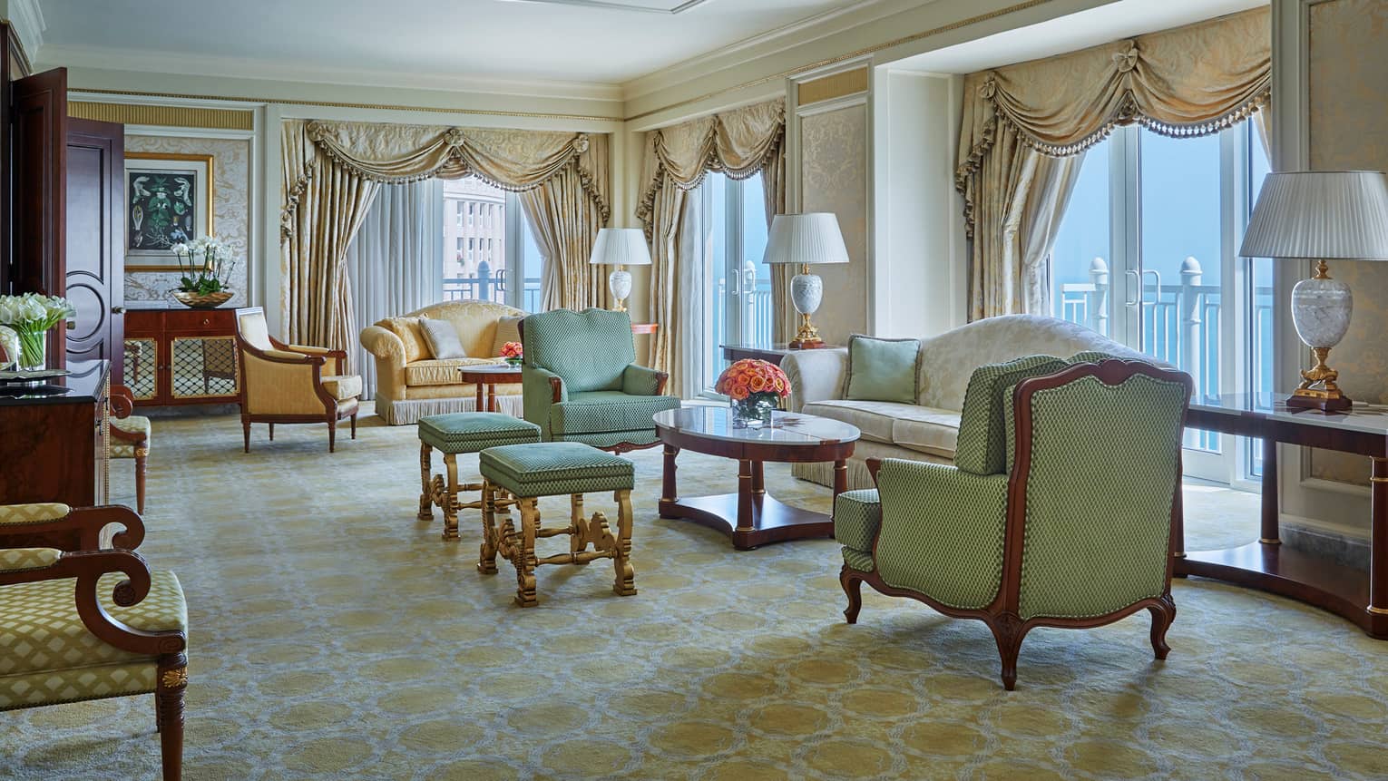 State Suite large living room with gold accents, antique-style sofas, curtains