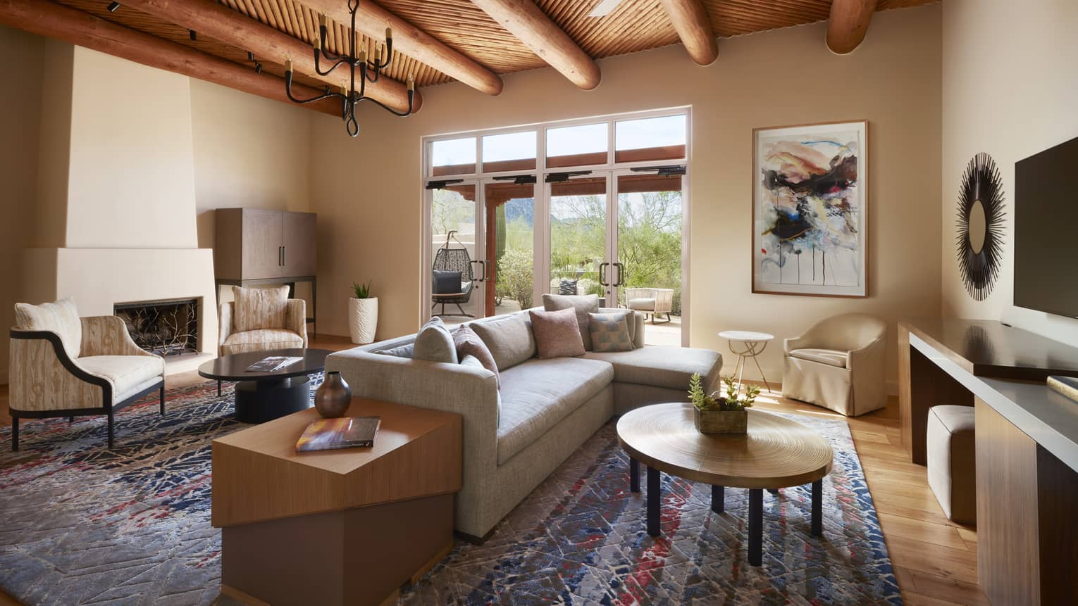 Prescott Suite seating areas under beam ceiling with small fan