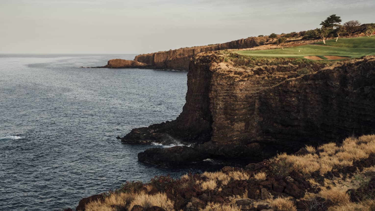 Golf course at Four Seasons Resort Lanai, cliffside along the ocean