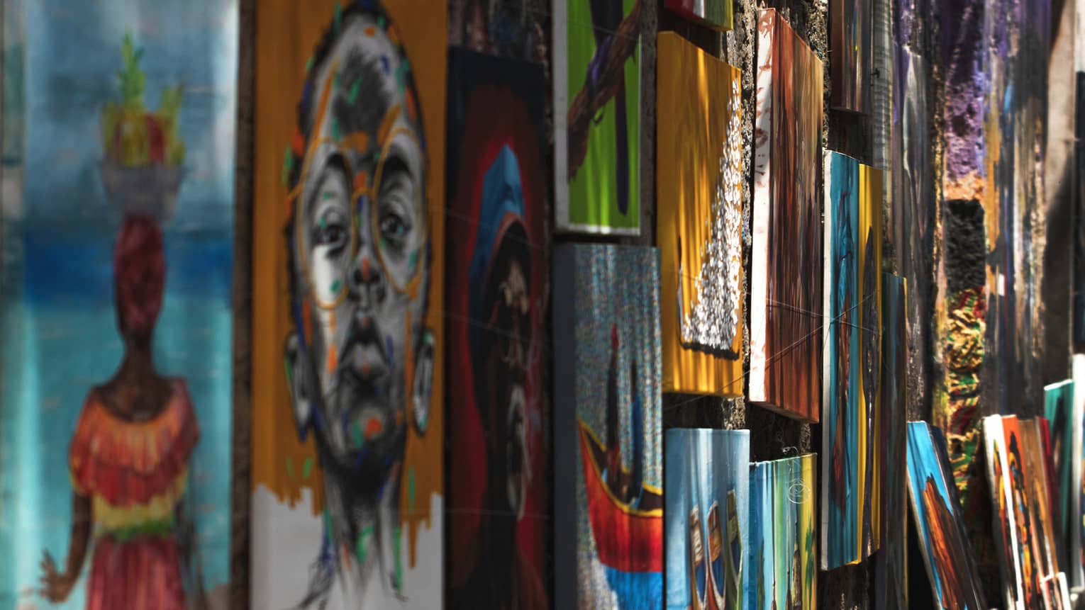 City street with colourful artwork on a wall