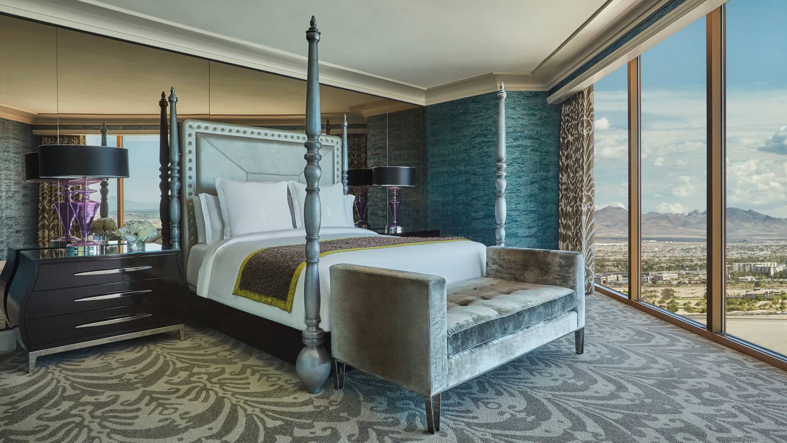 Presidential Strip-View Strip poster bed against mirror wall, grey velvet chaise, floor-to-ceiling windows