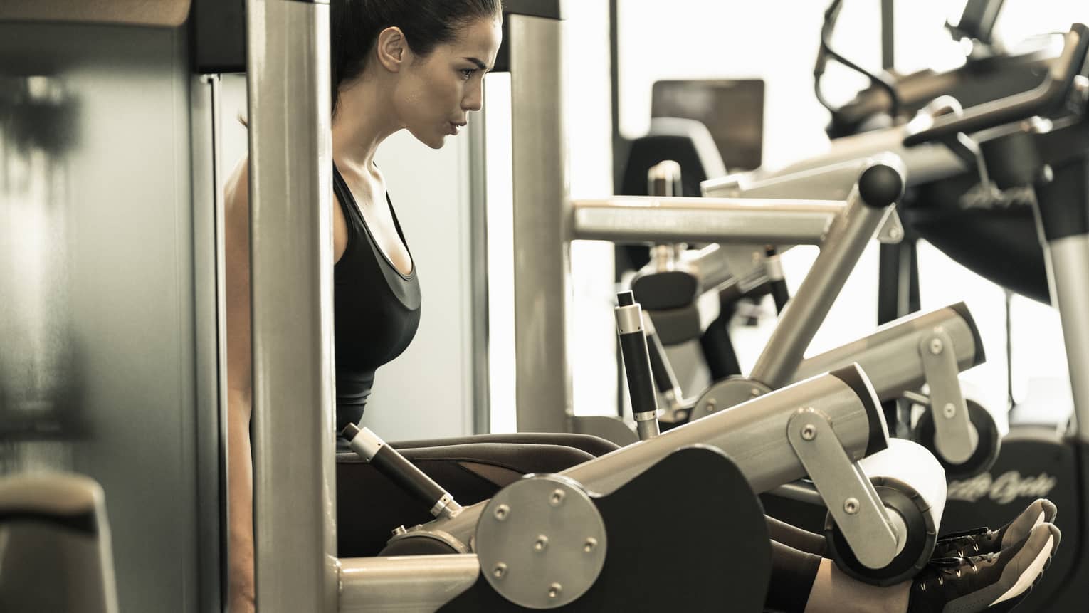 The gym at Four Seasons Hotel Kuala Lumpur features a variety of weight-training equipment