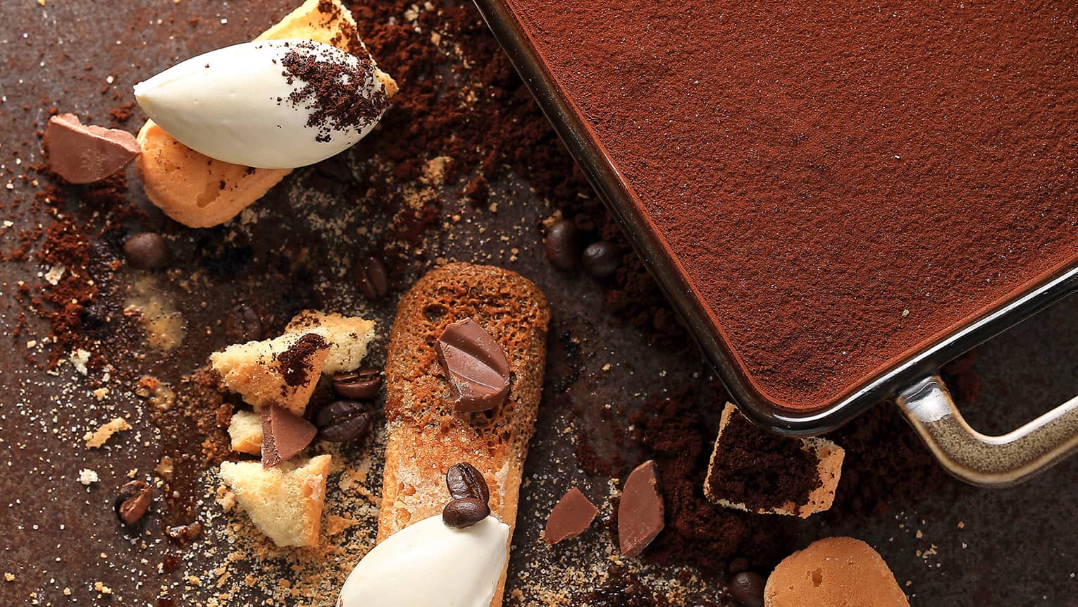 Looking down at cocoa cake topping, chocolate pieces,Tiramisu ingredients 