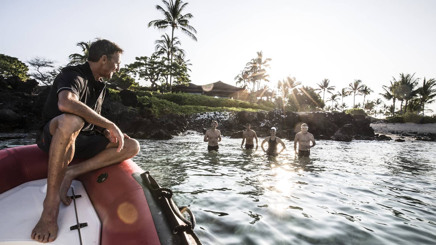 Guests in the water, training for a triathlon with Dave Scott