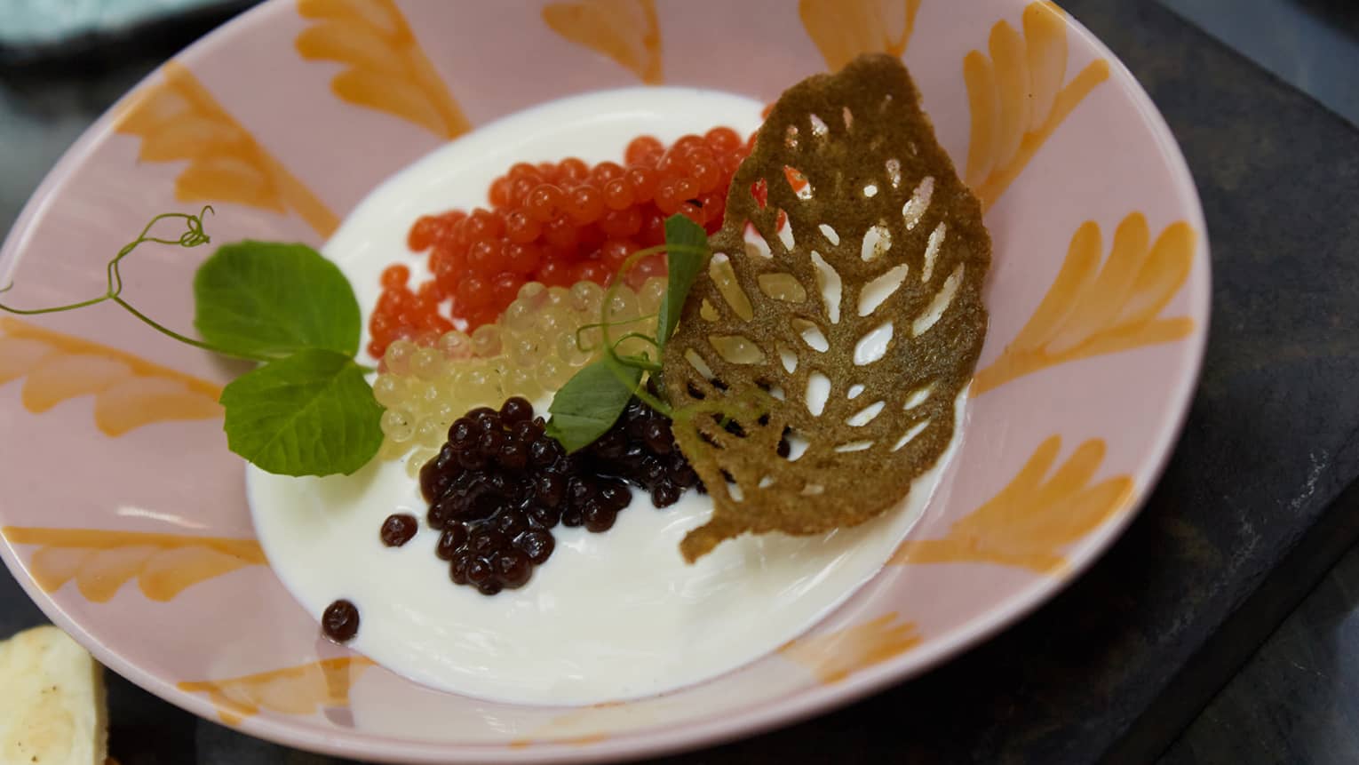 Roe in colourful bowl.
