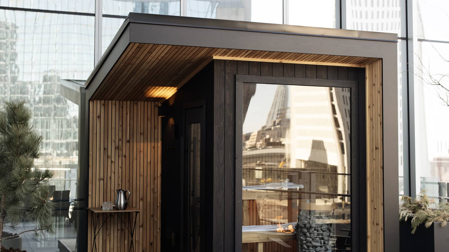 Indoor sauna with glass doors.