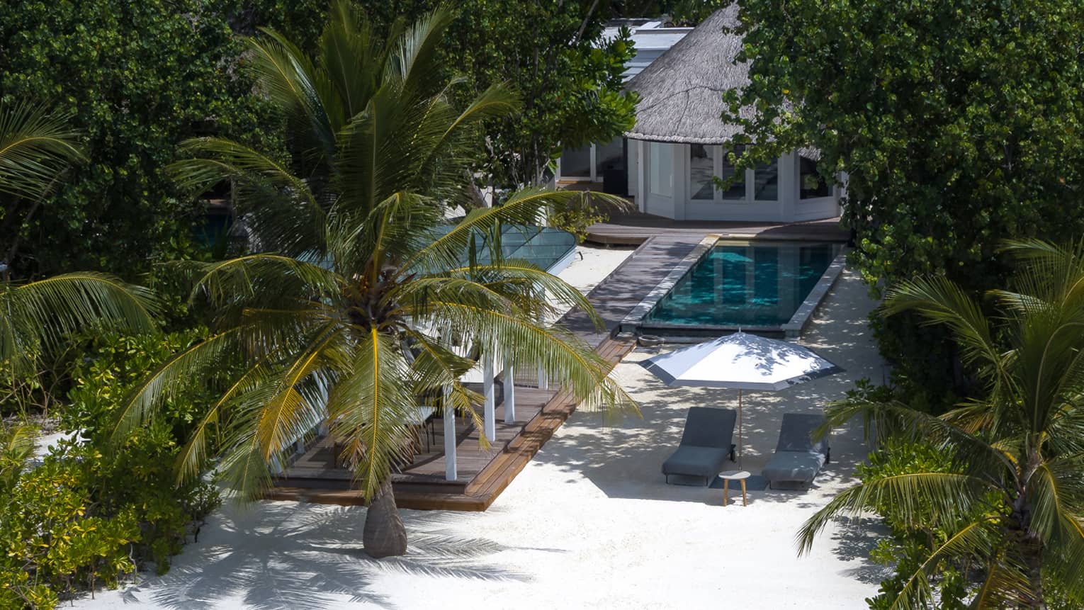 Aerial view of sunrise family beach villa 