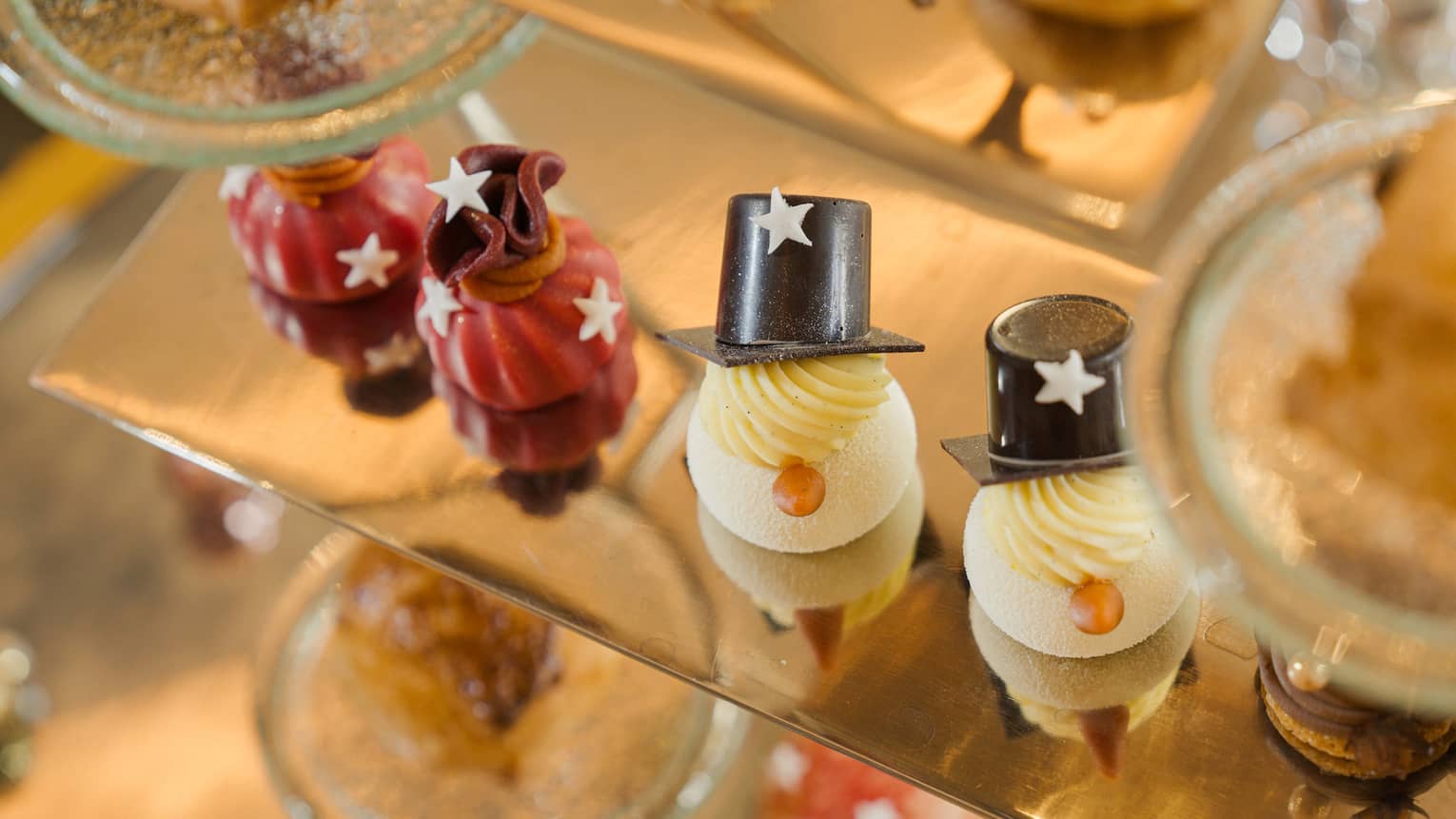Tiered tray filled with festive afternoon tea pastries