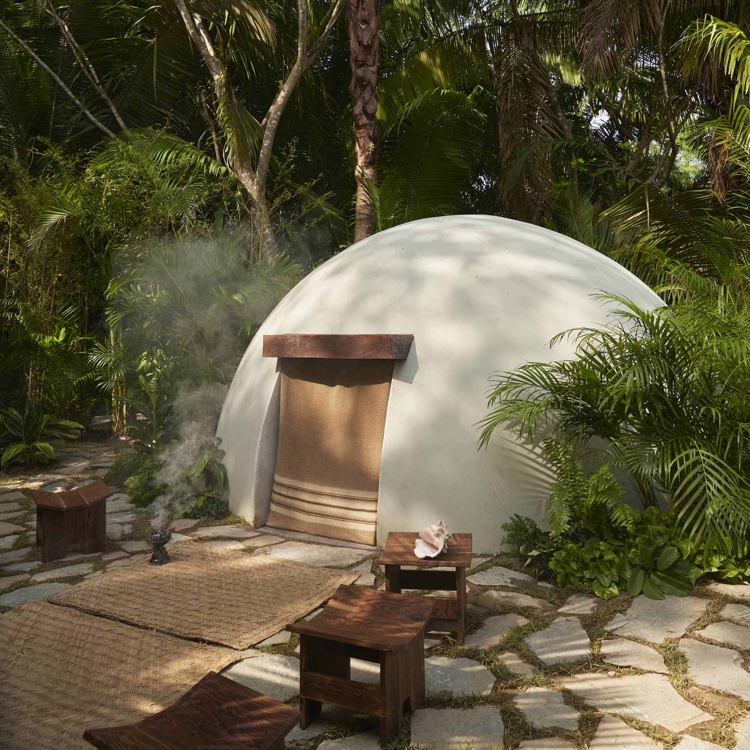 Traditional temazcal "house of heat" in jungle-like setting