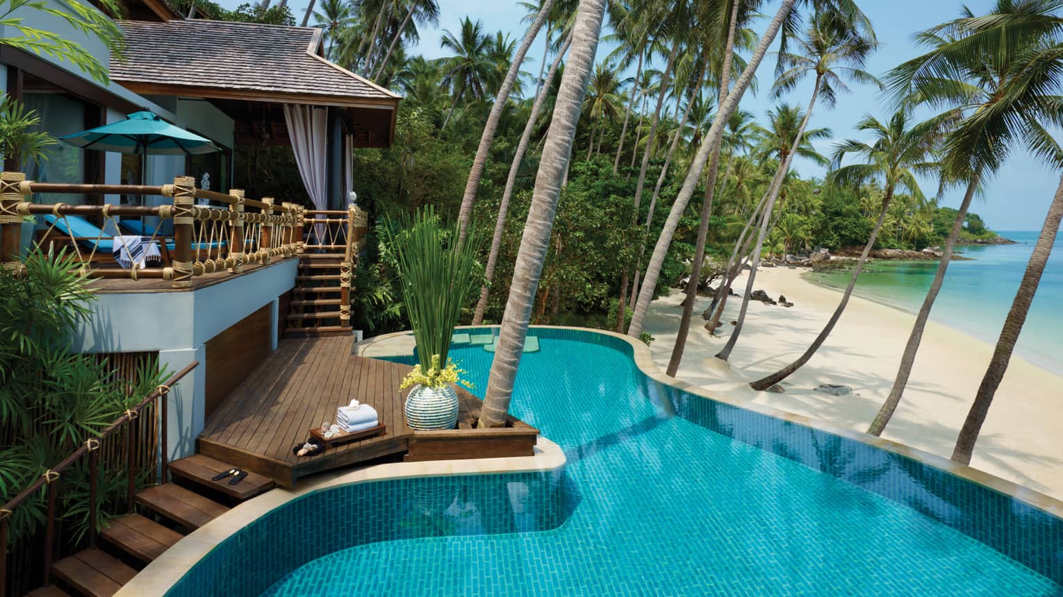 Beach Villa with Pool double-decker patio, swimming pool steps from white sand beach, ocean