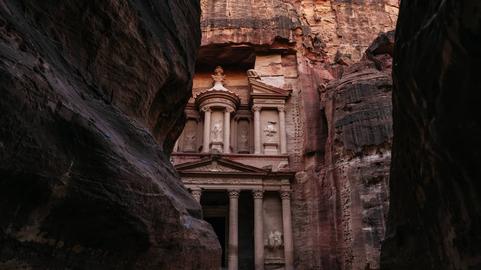 A sandstone cathedral carved in a mountain