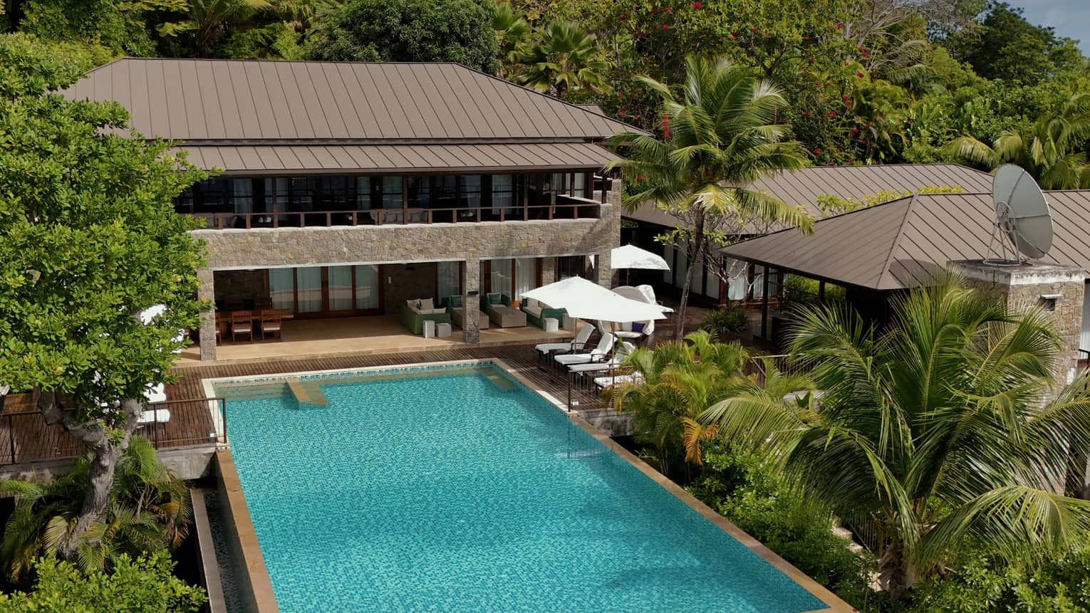Large private pool of a tropical residence