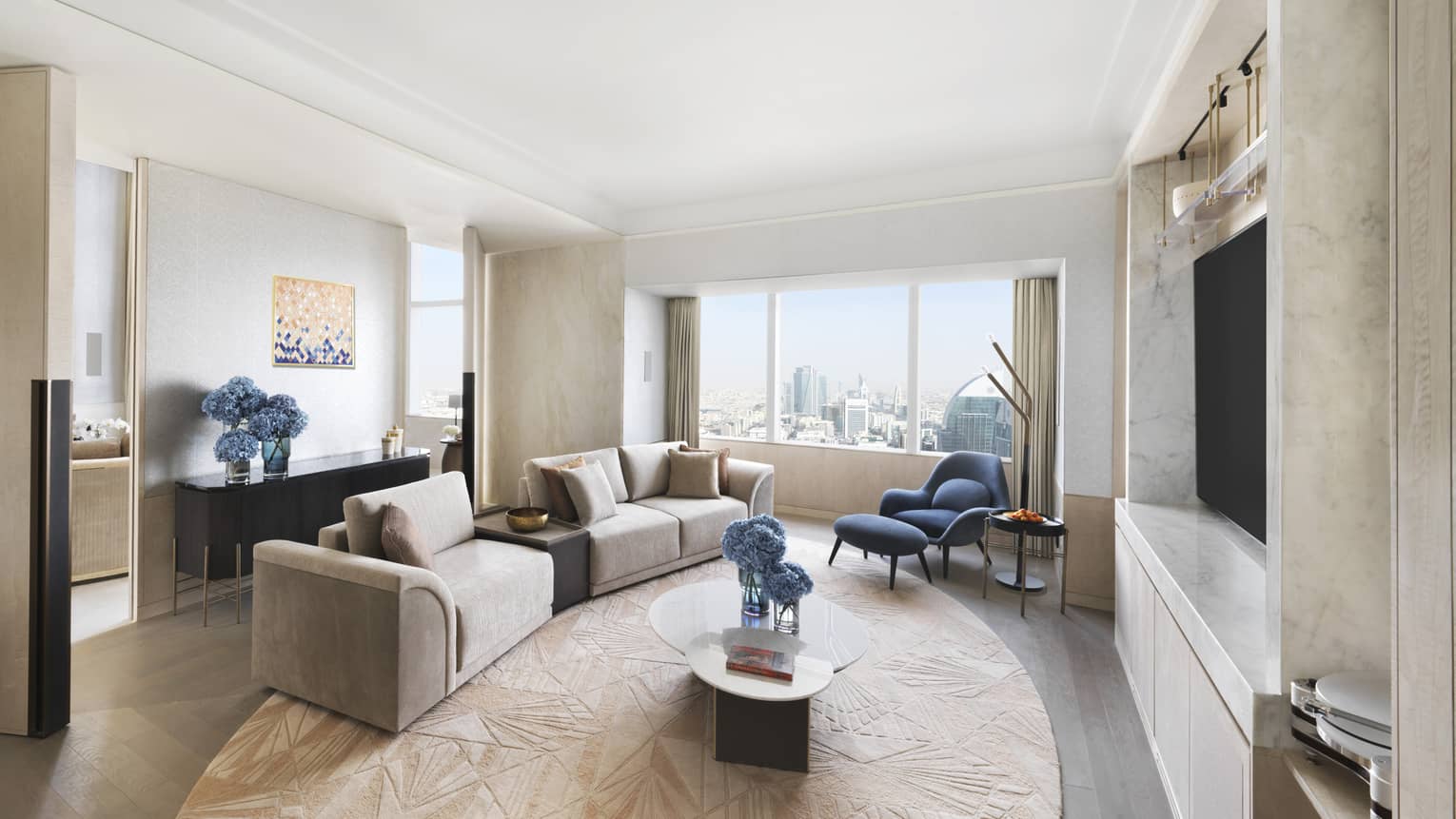 Media room with sofa, arm chair and TV