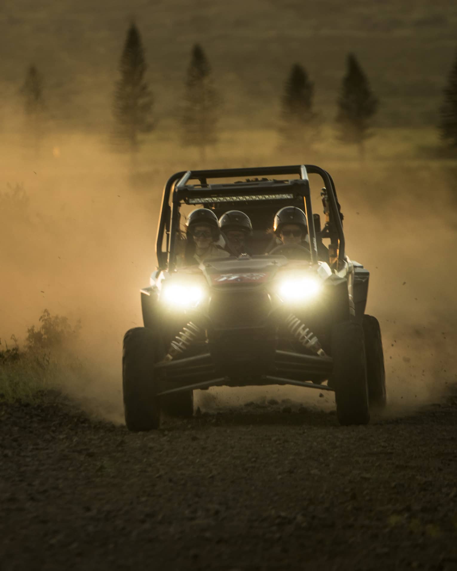 UTV rides through a rugged landscape