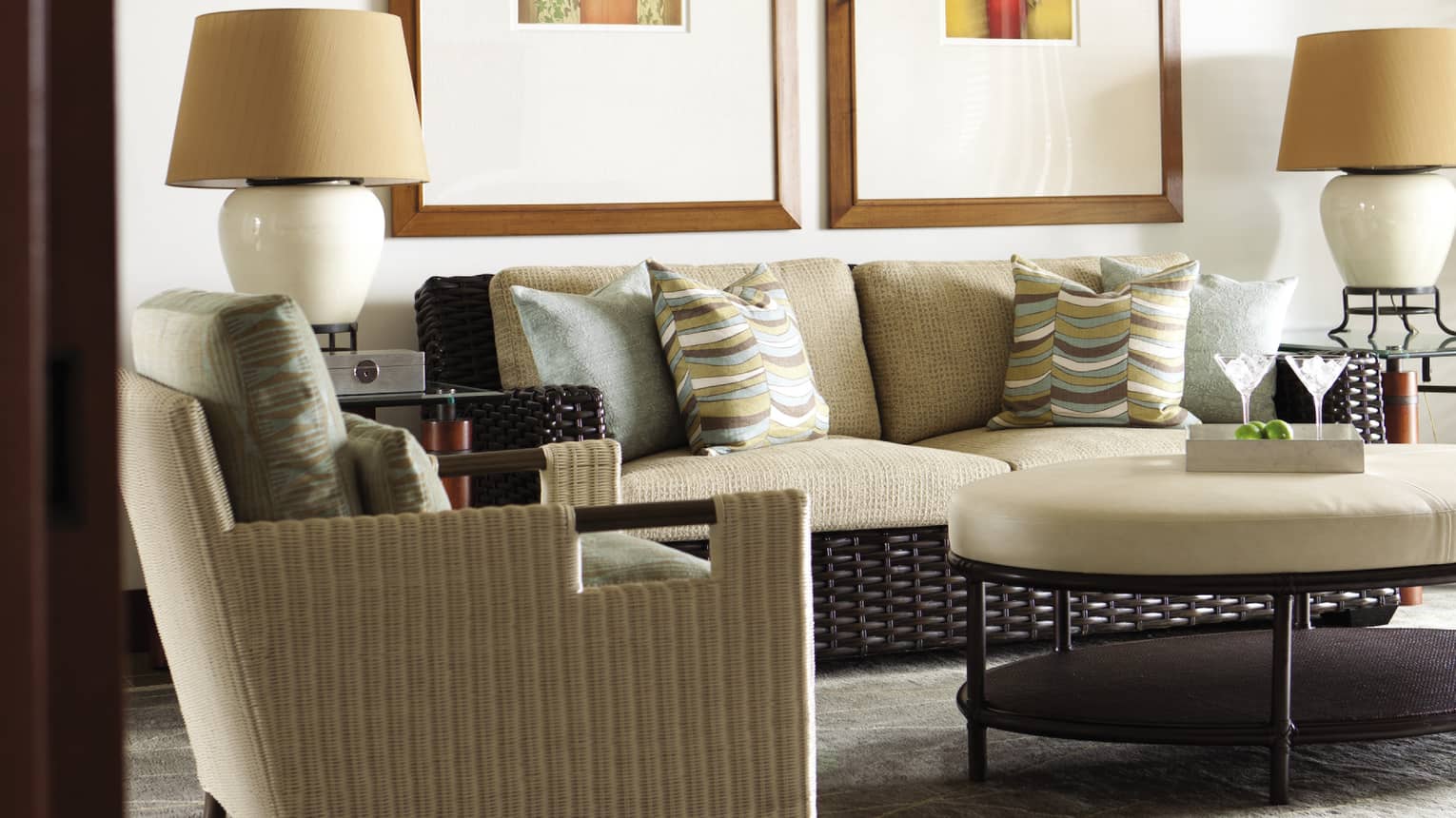 Superior Suite wicker chair, sofa, lamps around large white leather padded table