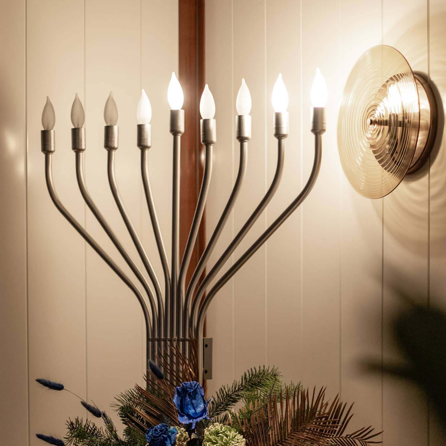 A menorah in a dimly lit room.