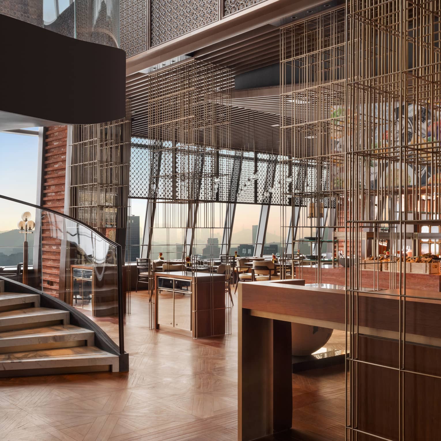 Restaurant at Four Seasons Hotel Dalian, with grand staircase and wall of windows
